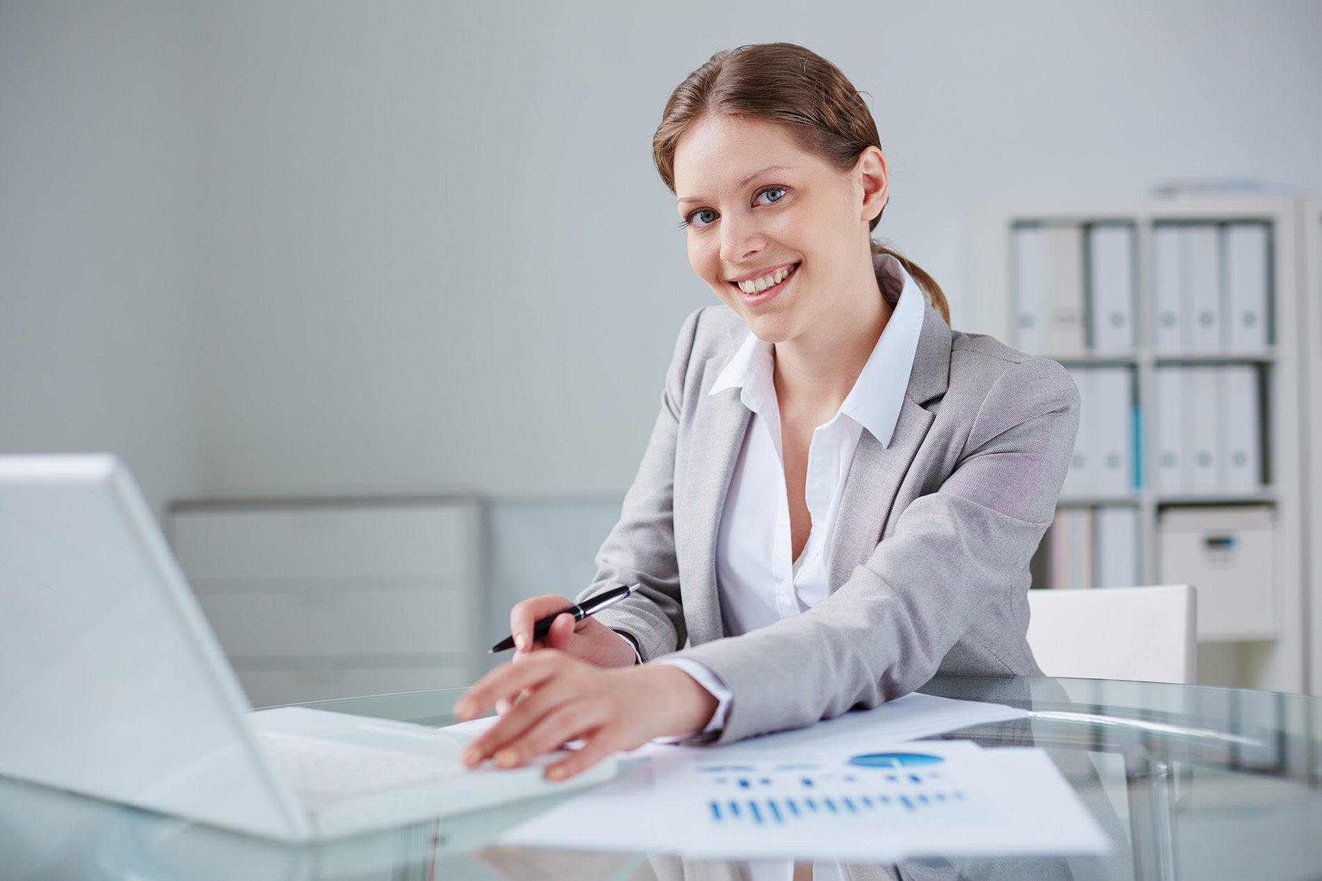 Young businesswoman working in office